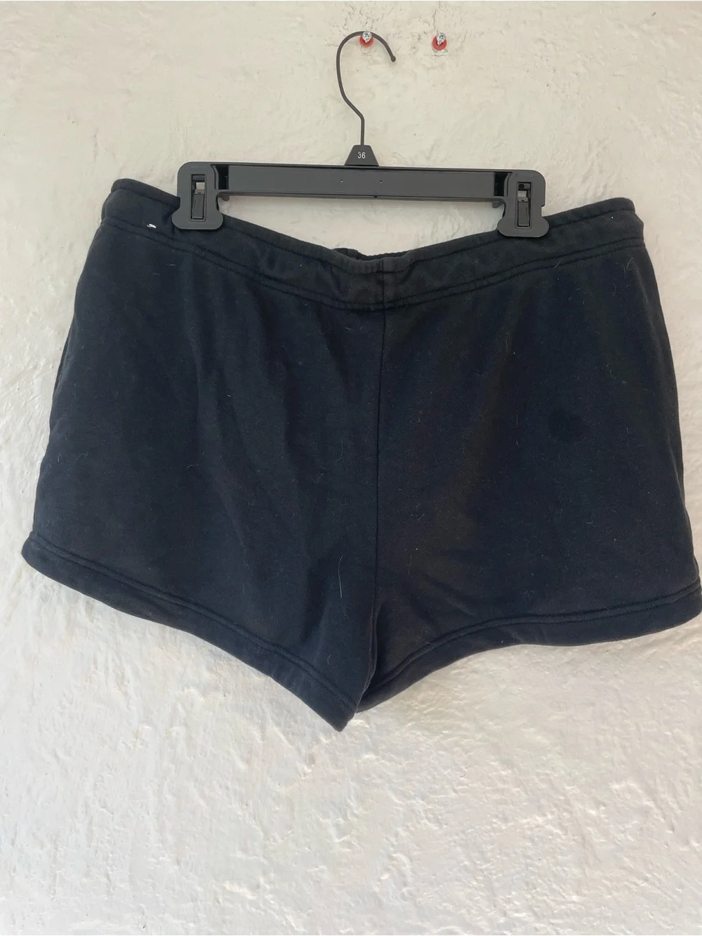 Black Nike athletic cotton blend sweat shorts drawstring pockets; size L
